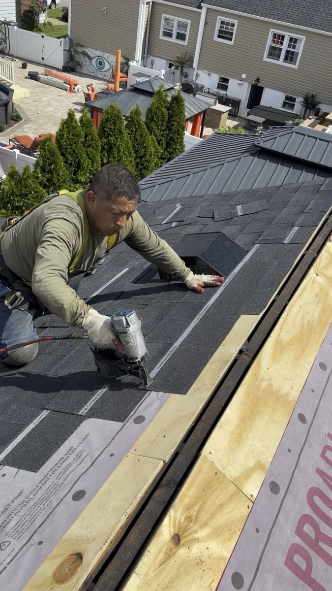 Roof leak repair in progress on a North Jersey home