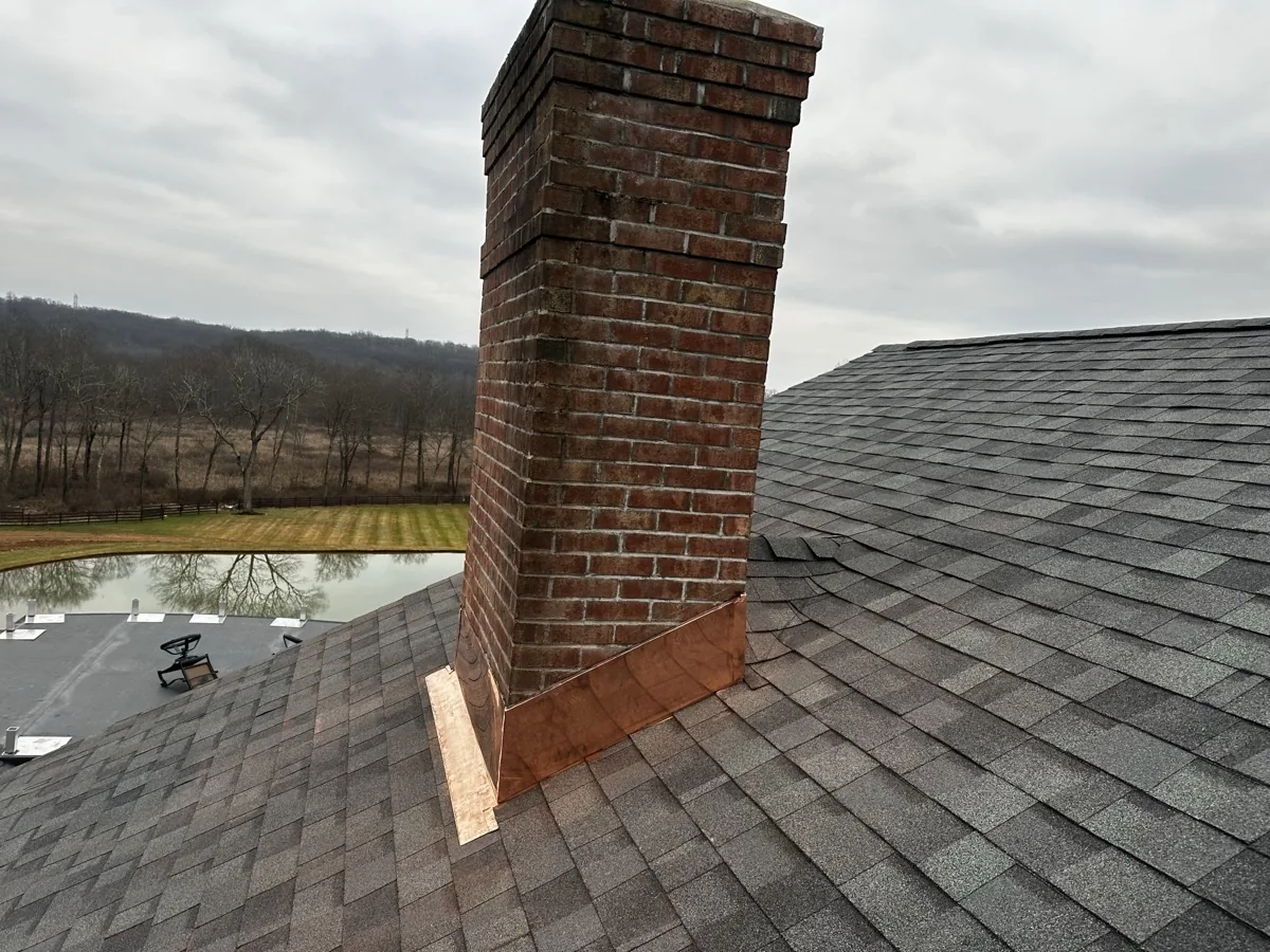 New chimney flashing sealed to the roofline in Clifton NJ
