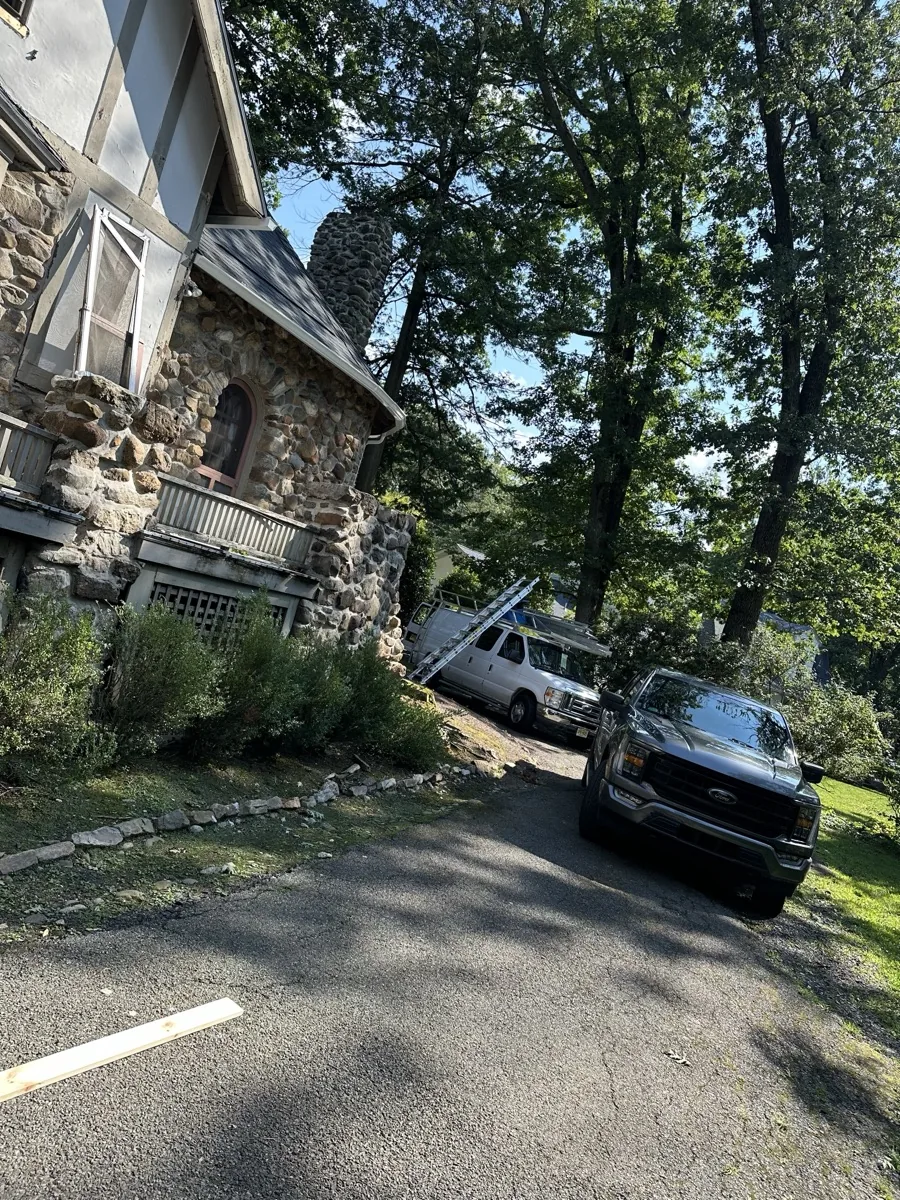 Masonry crew staging scaffolding for chimney work in Clifton NJ