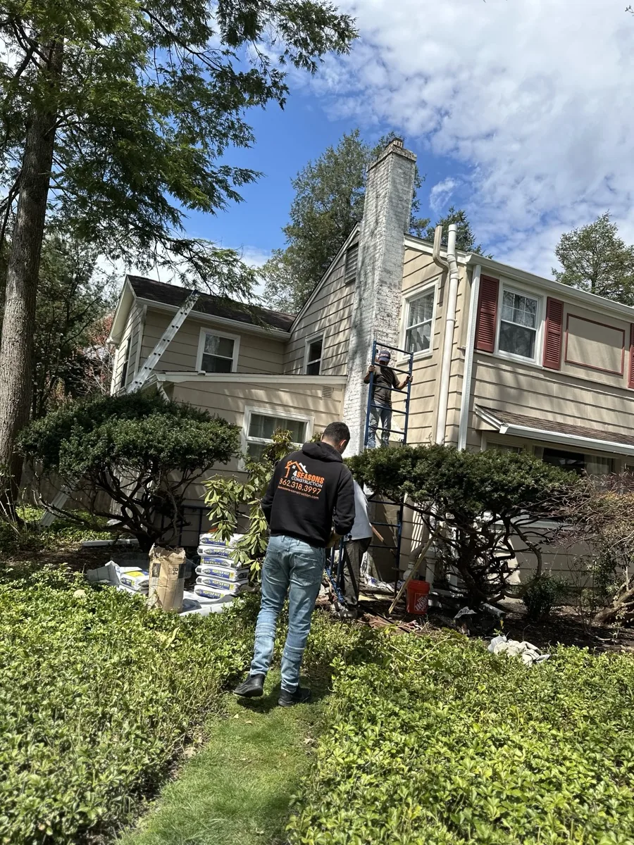 Chimney rebuild in progress on a Passaic NJ multi-family home